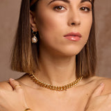 A chunky recycled gold chain is a perfect sustainable jewellery staple. This Gia Thick Gold Chain Necklace is a statement chain designed to be worn at the chest, perfect for layering with other necklaces as well as a standalone piece.