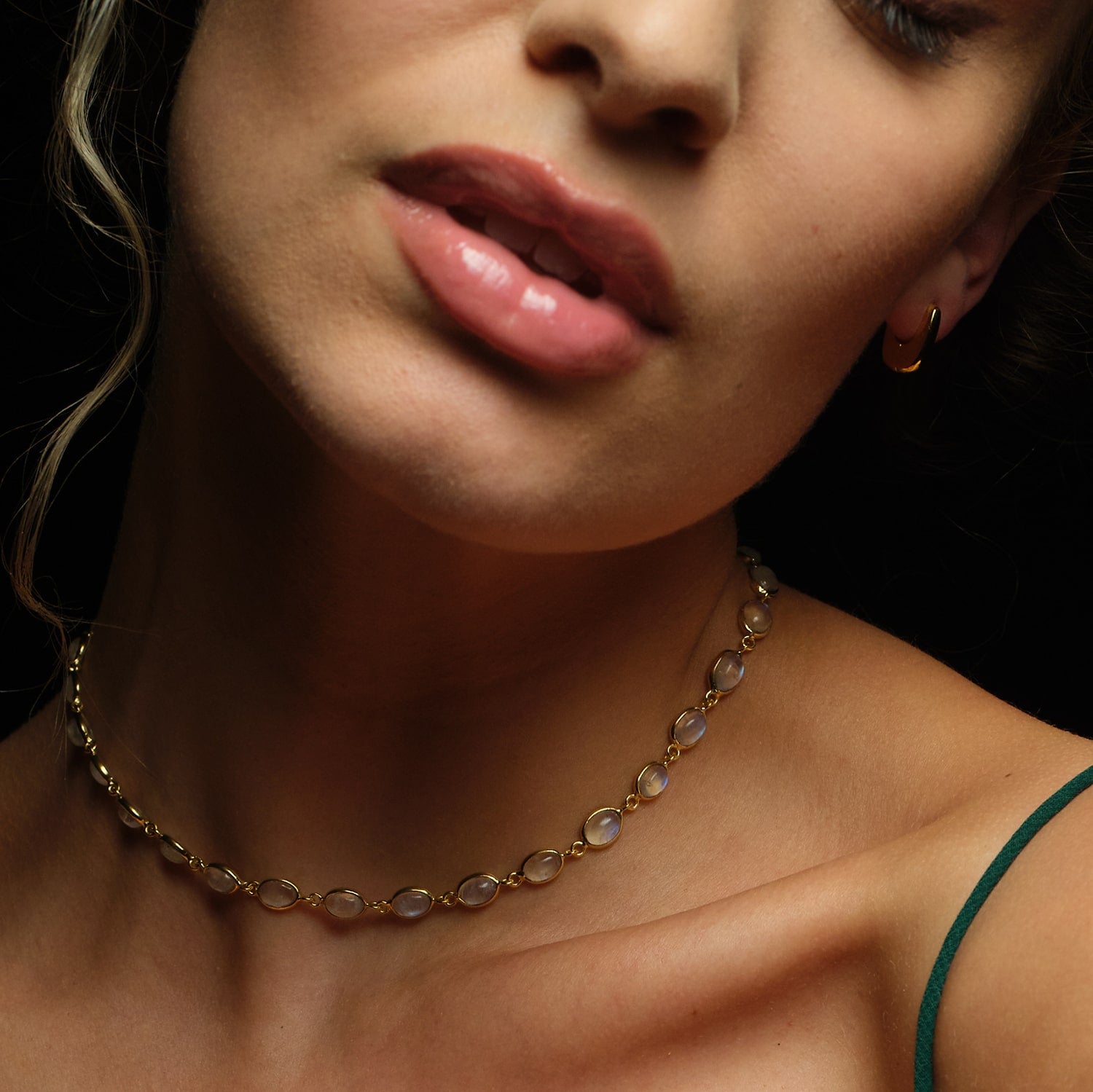 The Luna Moonstone Gold Chain Necklace is a sustainable necklace to keep for every season. On a recycled 18k gold chain, this features stunning vintage gemstones that&nbsp;may be worn as a chocker or extended to a longer version.