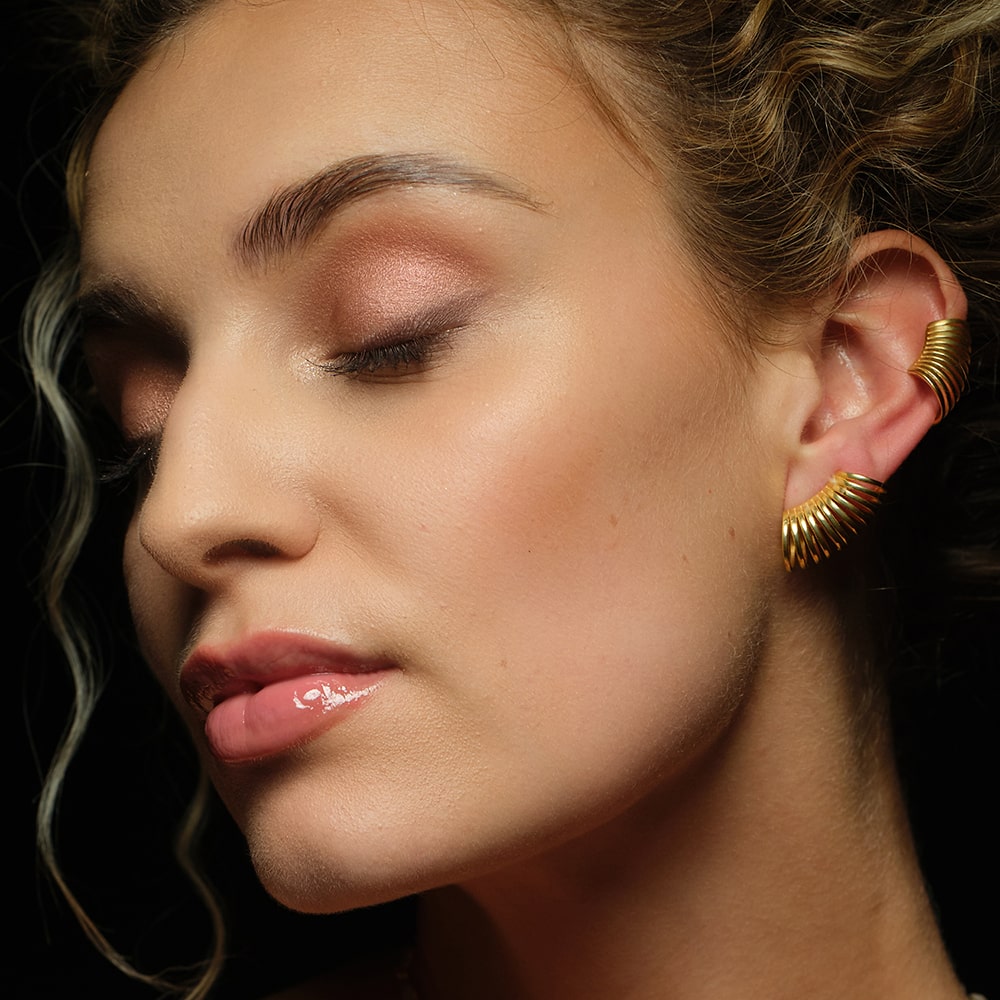 Add a sleek addition to your everyday styling with our collection of mini hoops in recycled gold and vintage pearls, pre-loved gemstone huggies and smaller versions of our most popular statement earrings.