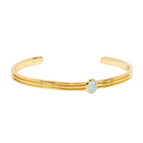 Designed with comfort, luxury and everyday wear in mind, the Athena Gold Cuff With Green Chalcedony is a sleek and lustrous bangle featuring a stunning hand cut green gemstone. The perfect base layer for your wrist stack.