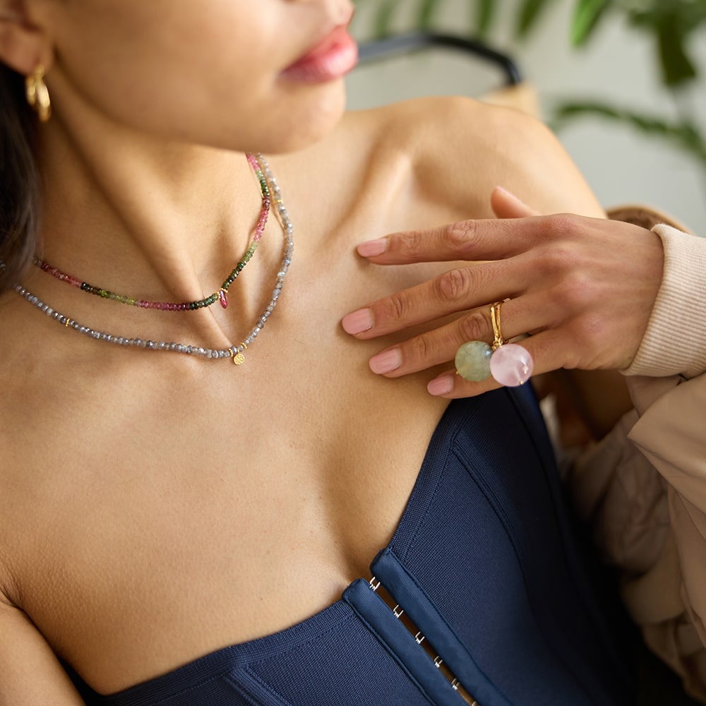 The Bubble Green Aventurine Ring features a stunning large round pale green stone, attached to a fully size adjustable gold ring band. This allows the stone to move freely around your finger making this a unique ri