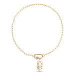 The Daphne Gold Paperclip Chain Necklace features dainty small white vintage pearls coating the carabiner lock. The lock features a stunning white pearl with gold chips called barnacles.