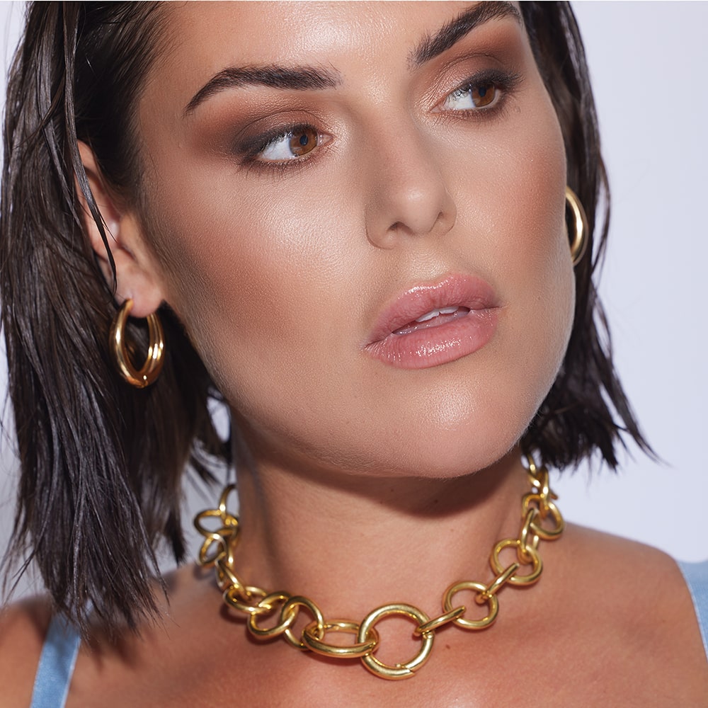 Effortless everyday styling. Just how we like it with out Lola Chubby Round Hoop Earrings.  Heavy enough to make a statement without weighing you down too much thanks to the hollow center, you can just wear one or more on eac