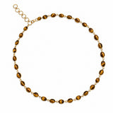 Vintage tiger’s eye gemstones bring rich golden-brown tones to the Luna necklace, complemented by the warmth of an 18k gold vermeil chain.