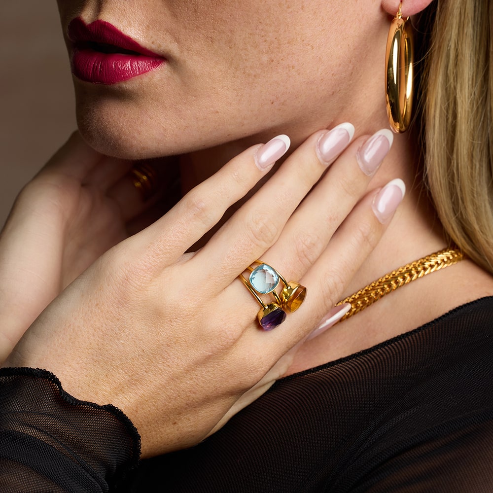 The Sophia Blue Topaz Gold Ring is embellished with a raised and faceted vintage gemstone. This sustainable jewellery piece is best paired with the same style ring with different gemstones.