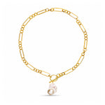 A gold paperclip chain necklace with a toggle clasp and a dangling baroque pearl, shown on a clean white background.
