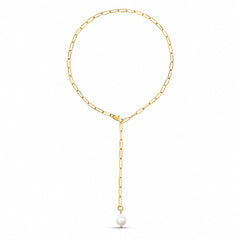 A gold chain necklace with a paperclip link design, featuring a Y-shaped drop that ends in a single white pearl pendant, shown against a plain white background.