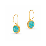 A pair of gold drop earrings with oval turquoise-blue stones in a textured bezel setting, shown on a clean white background.