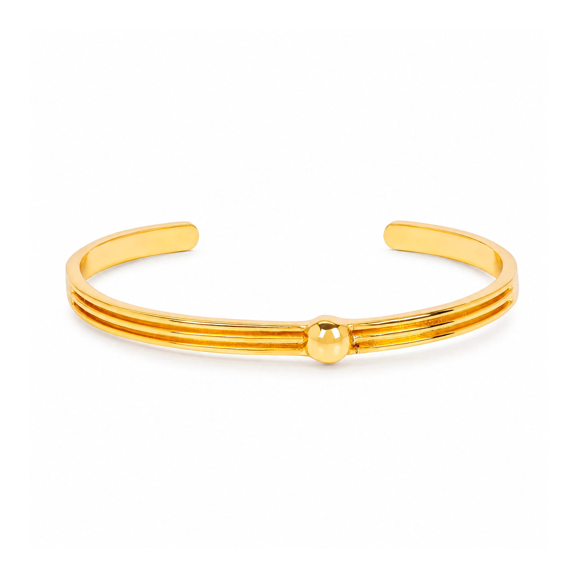 A polished gold-tone metal cuff bracelet with three parallel bands and a small central bead, shown on a clean white background.