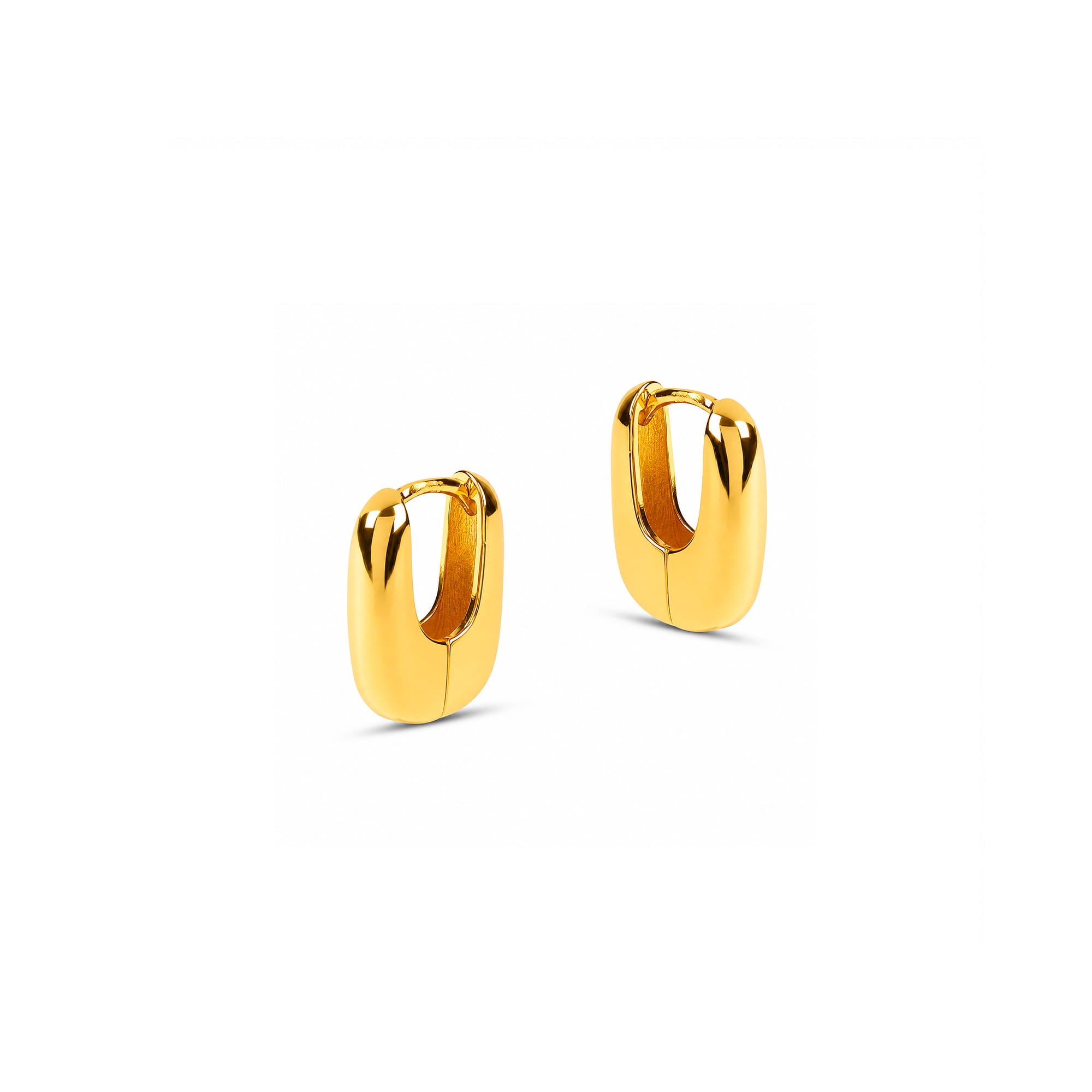 A pair of polished gold huggie hoop earrings on a clean white background.
