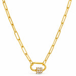 A gold paperclip chain necklace with a padlock pendant encrusted with small clear gemstones, shown on a plain white background.
