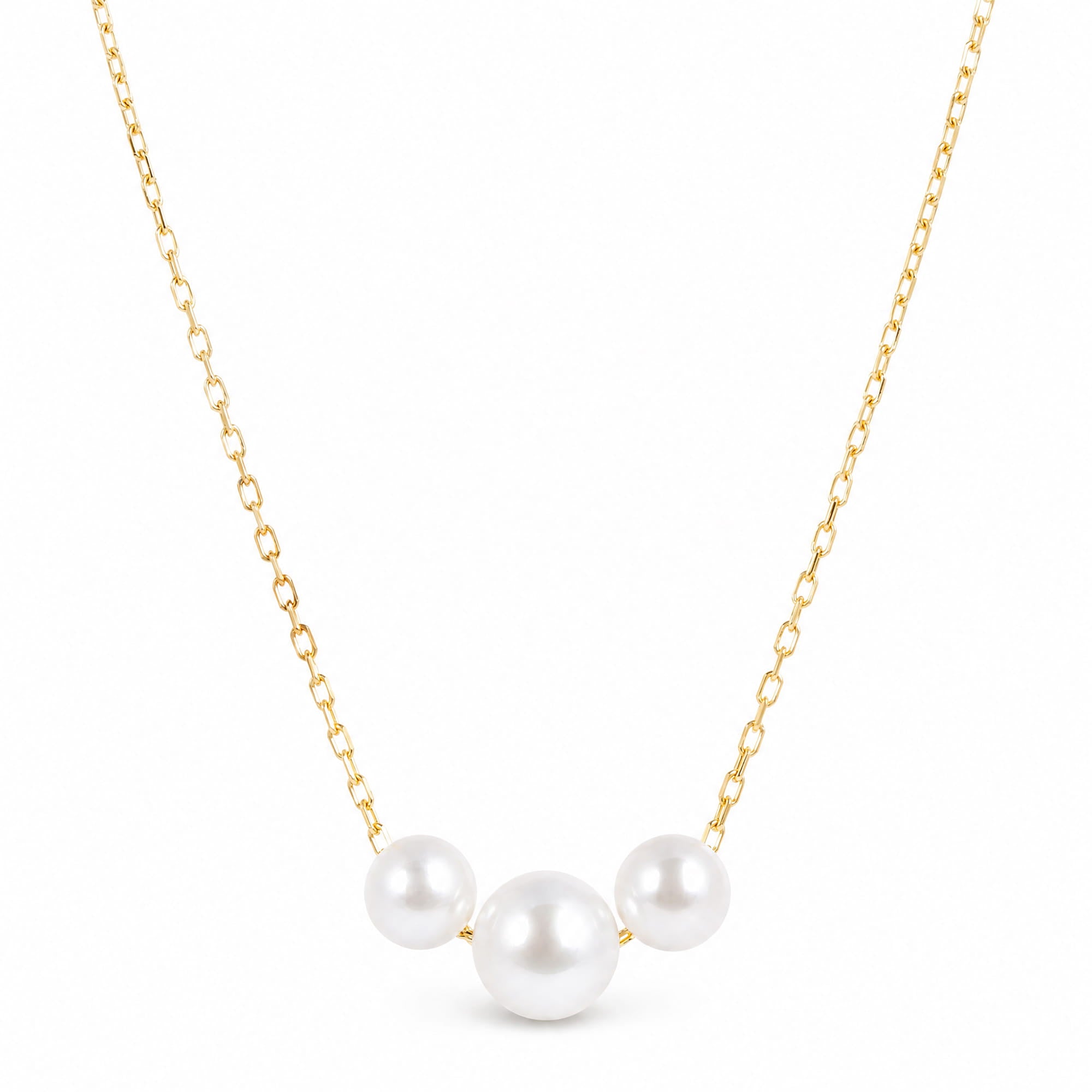 A delicate gold chain necklace featuring three white freshwater pearls arranged in a V-shape pendant, set against a clean white background.