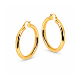 A pair of polished yellow gold hoop earrings on a clean white background.