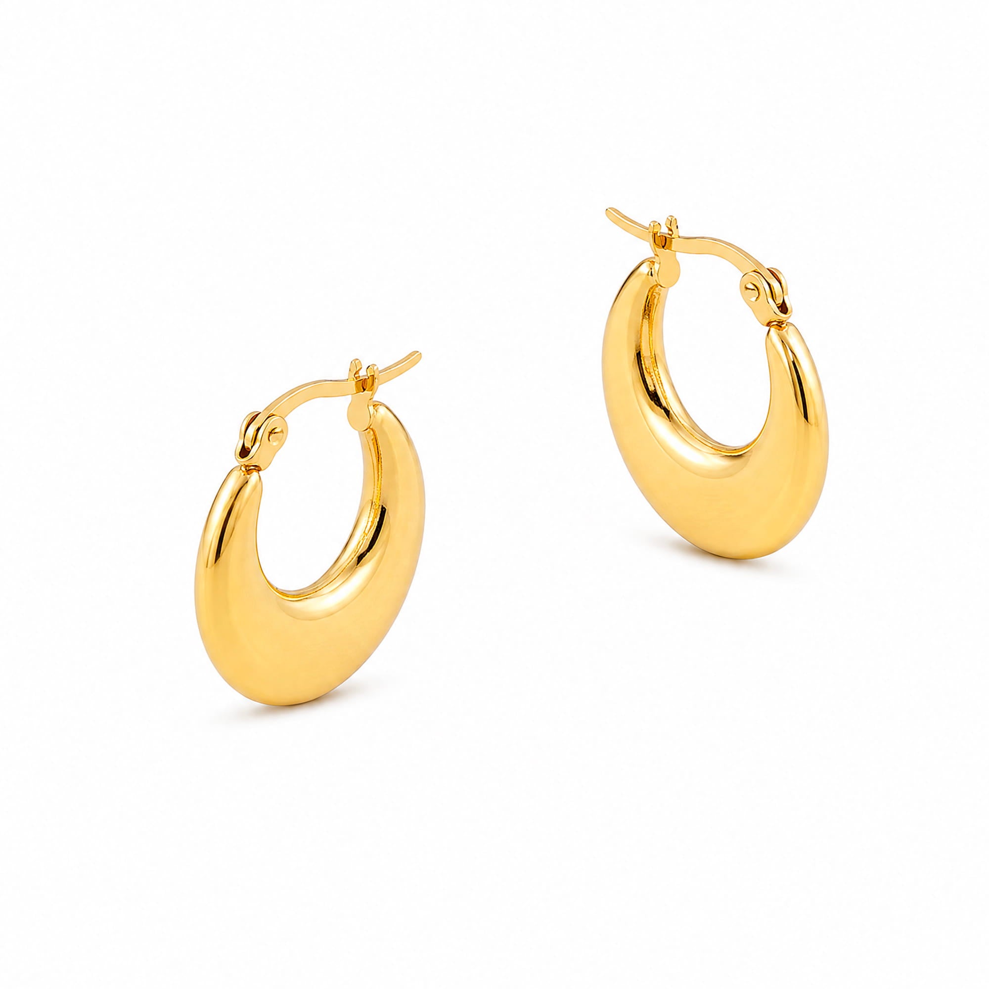 A pair of polished gold huggie hoop earrings on a clean white background.