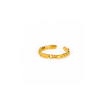 A textured gold open cuff ring with a twisted, organic chain-like design, shown on a plain white background.
