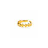 A gold adjustable ring with a textured geometric diamond pattern, shown on a plain white background.