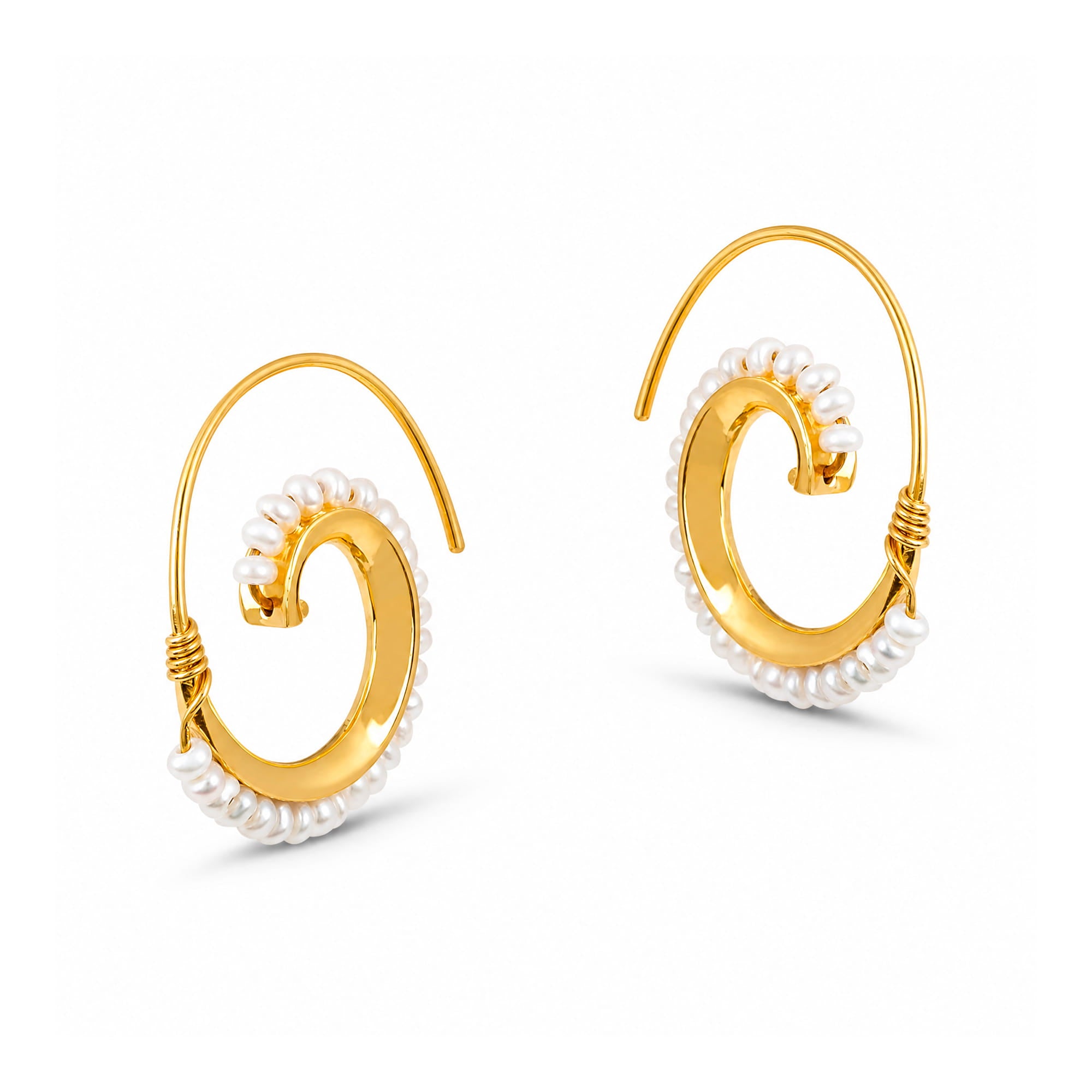 A pair of gold hoop earrings decorated with white baroque pearls along the outer edges, shown on a clean white background.