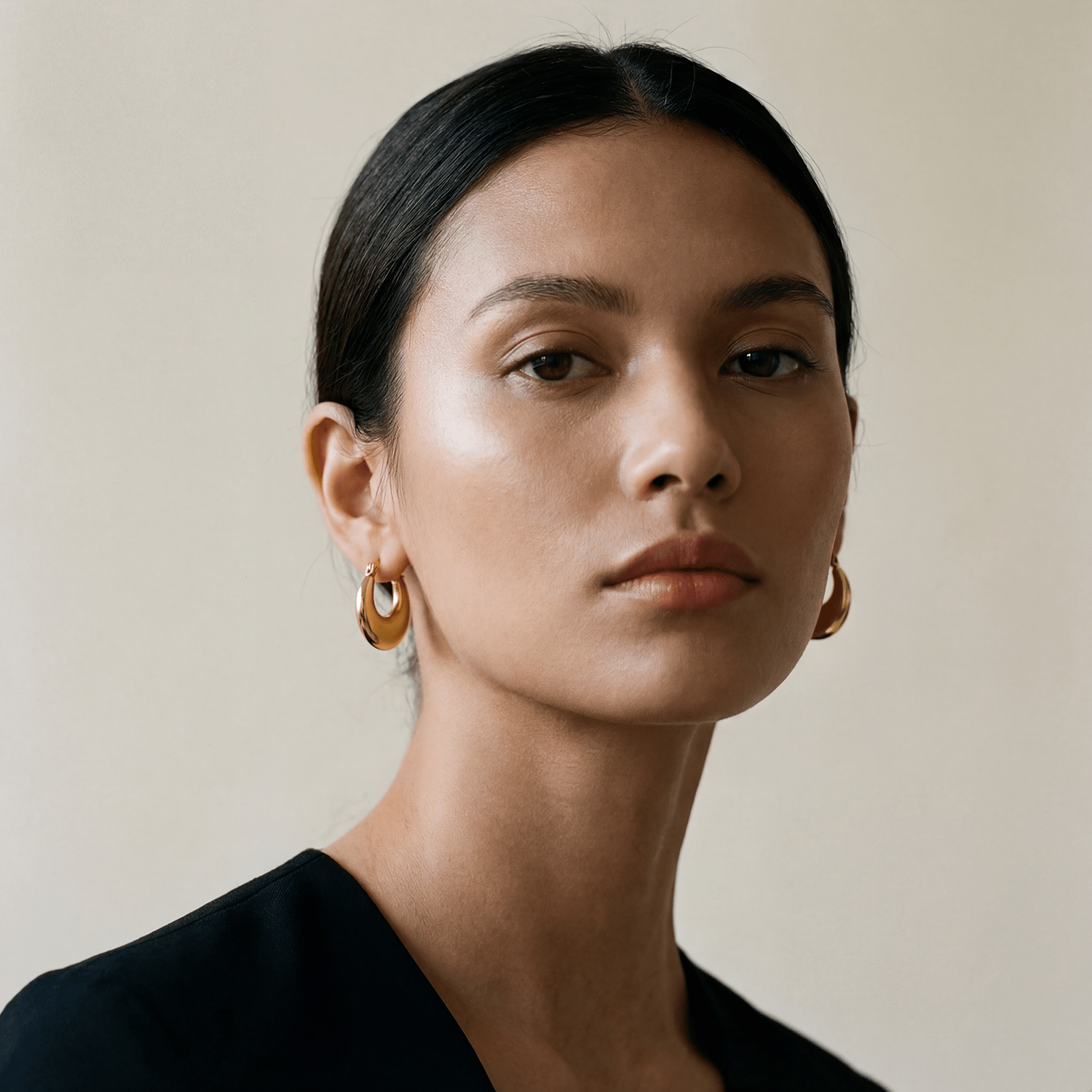 An elevated basic, the Lola Flat Moon Hoop Earrings are the perfect finishing touch to any ear stack. Handmade in upcycled brass and sustainable 18k gold plating, you won't want to take them off