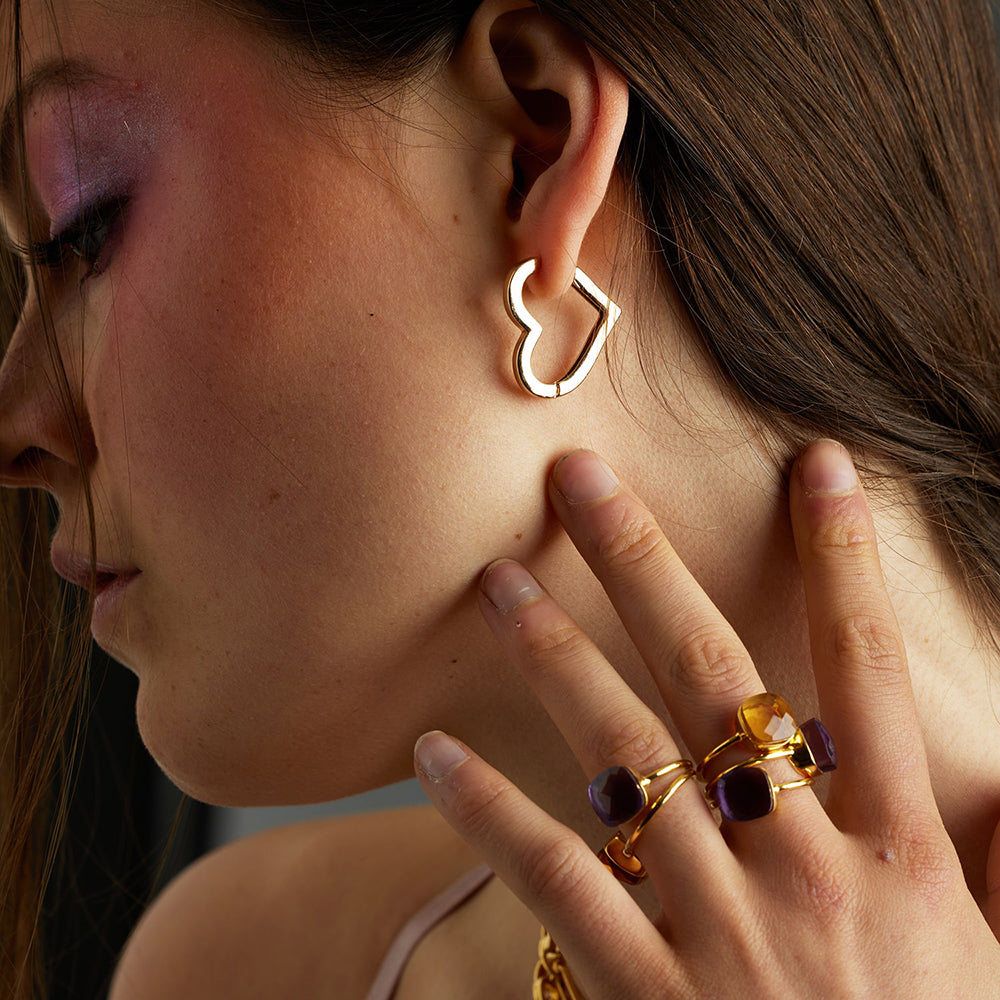 Ready to fall in love? These Bella heart Shaped Hoops were made for you! There are the investment piece you'll love for years to come; a cute heartc shape with a smooth finish these gold hoop earrings will be your forever go-to's.