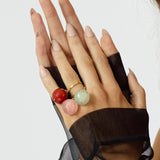 The Bubble Green Aventurine Ring features a stunning large round pale green stone, attached to a fully size adjustable gold ring band. This allows the stone to move freely around your finger making this a unique ring. 
