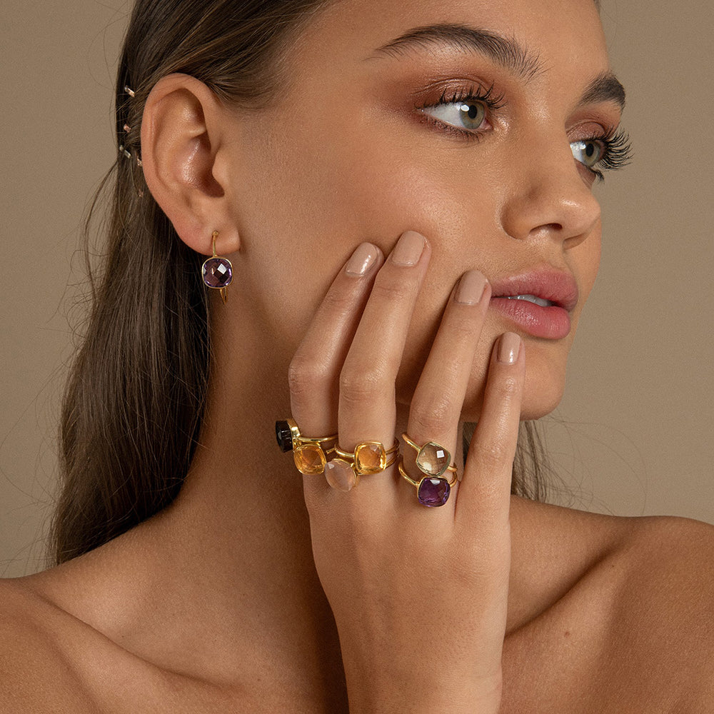 The Sophia Amethyst Gold Ring is embellished with a raised and faceted vintage gemstone. This sustainable jewellery piece is best paired with the same style ring with different gemstones.